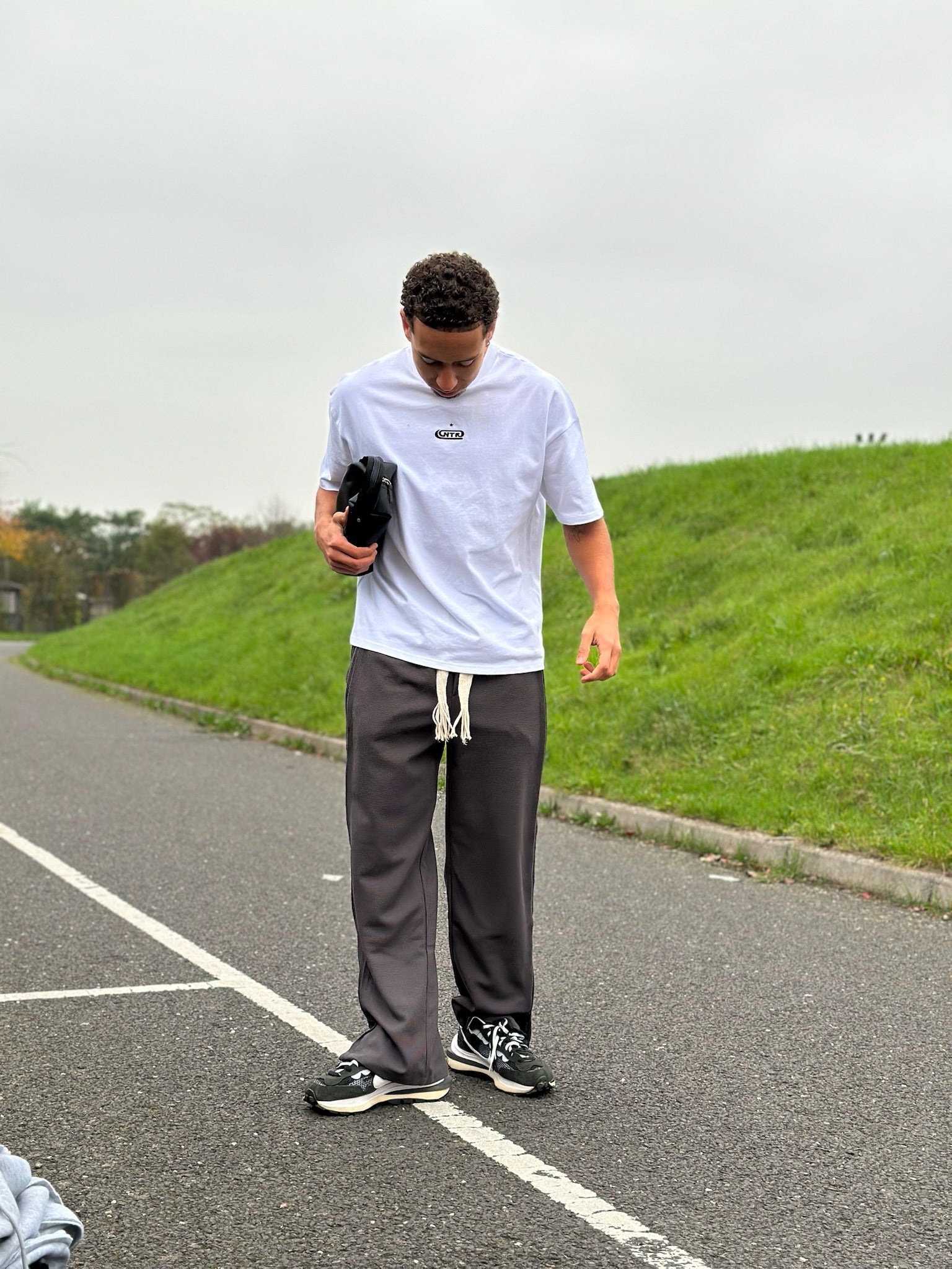 white-oversized-T shirt-charcoal-grey- joggers-split hem- wide leg